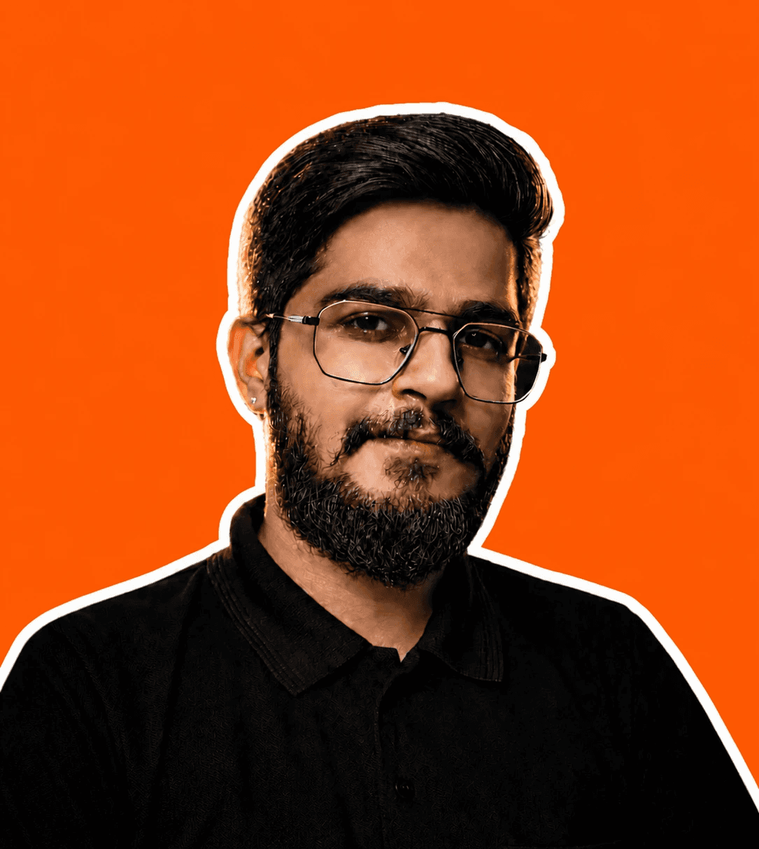 Pratik Jangid, wearing glasses and a black shirt